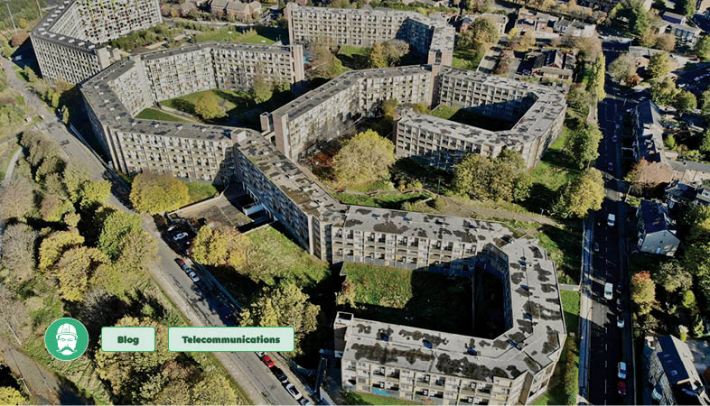 Aerial view of Multi-Dwelling Units showing large-scale building connectivity needs.