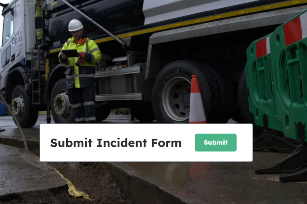 Utility operative submitting an incident form digitally from site