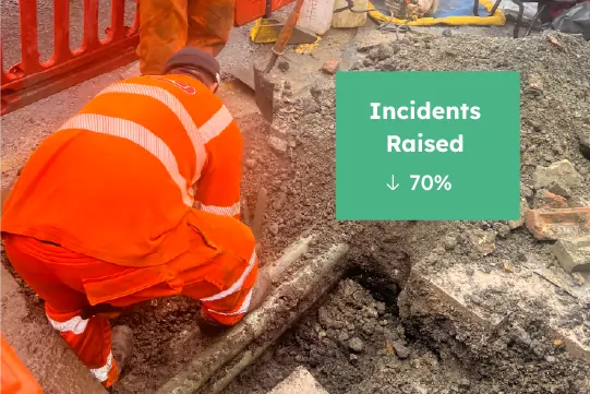 Utility operative working at an excavation with a reduction in safe digging incidents.
