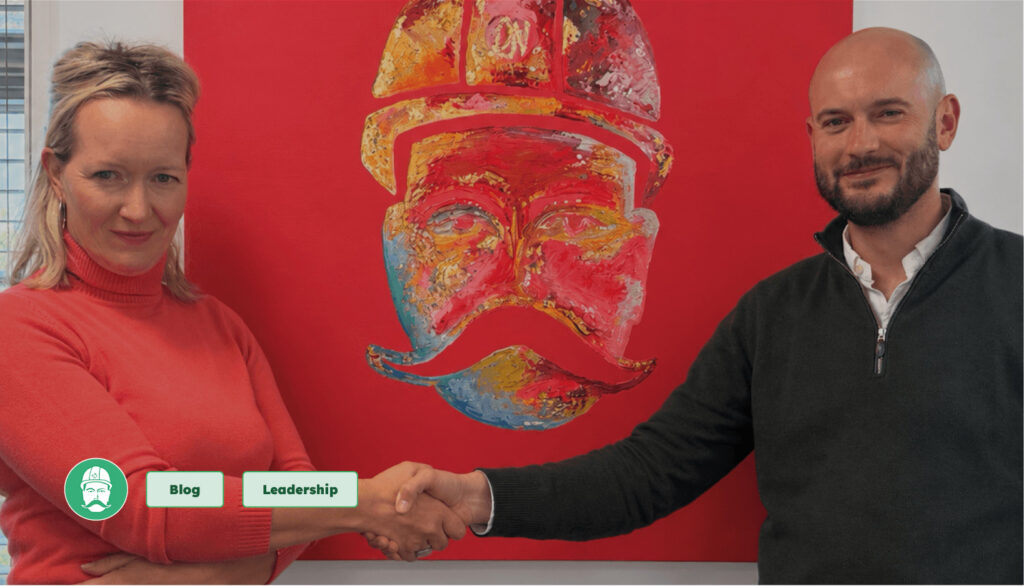 Holly Dalby and James Moore shaking hands following James Moore’s appointment as Managing Director of Depotnet