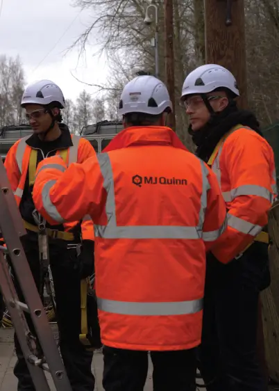 MJ Quinn operatives working together on a telecommunications site.